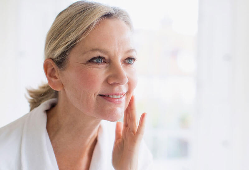 Beauty, skin care, and makeup tips for the over-50 set anti aging applying face cream